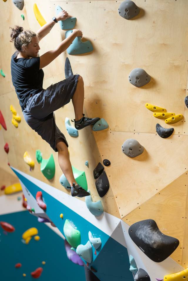 Climbers on the overhang wall at BoulderRyn