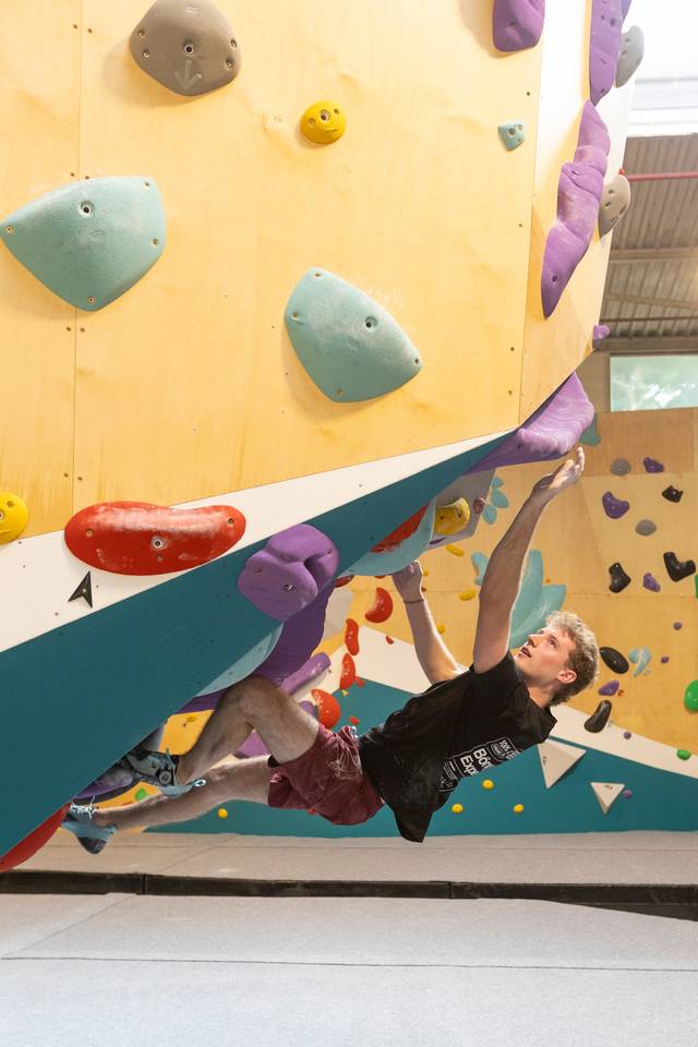 Bouldering wall with route holds